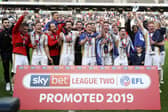 MK Dons celebrate their promotion in 2019