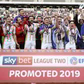 MK Dons celebrate their promotion in 2019