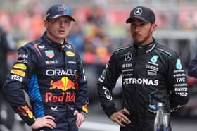 Max Verstappen with Lewis Hamilton