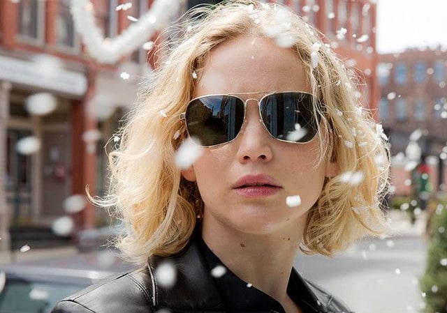 <p>Jennifer Lawrence wearing gold-framed aviators in the movie Joy</p>