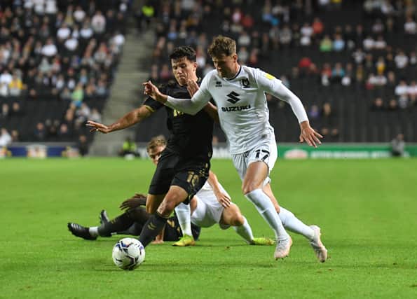Ethan Robson battles for the ball against Charlton