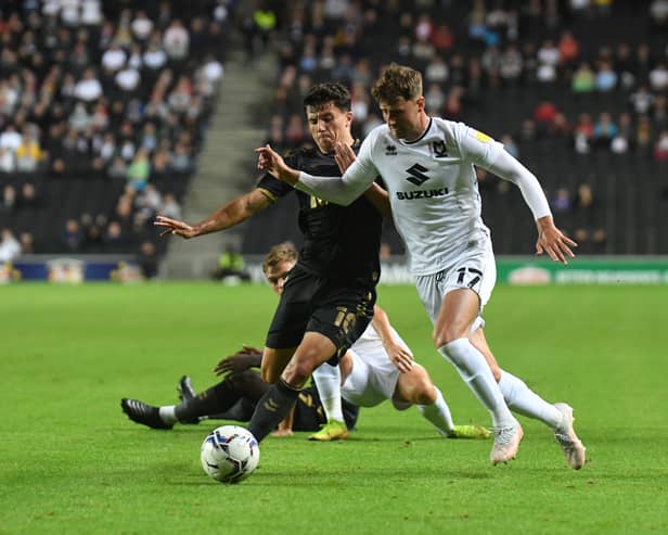 Ethan Robson battles for the ball against Charlton