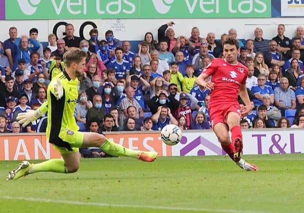 Matt O’Riley strokes home Dons’ equaliser in the thrilling 2-2 draw with Ipswich Town at Portman Road