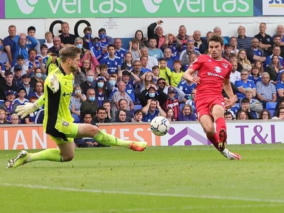 Matt O’Riley strokes home Dons’ equaliser in the thrilling 2-2 draw with Ipswich Town at Portman Road