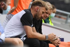 Chris Hogg admitted he was more than happy to remain at Newcastle United, working in their academy, but said as soon as Liam Manning called him to take up a role at MK Dons, he jumped at the opportunity