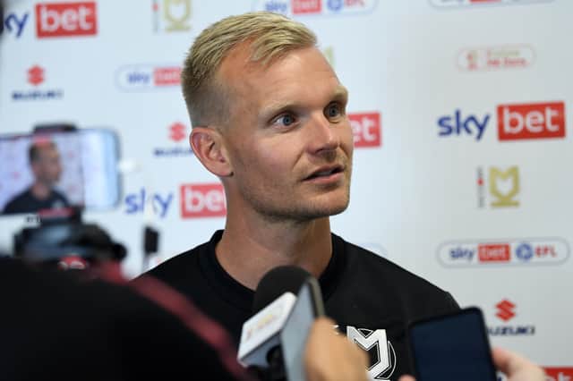 Liam Manning has hinted that MK Dons could do business before the transfer window closes on Tuesday night