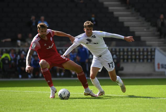 Ethan Robson had to battle hard in the midfield against Accrington. Goals from Mo Eisa and Matt O’Riley though secured the three points for MK Dons in their 2-0 win at Stadium MK