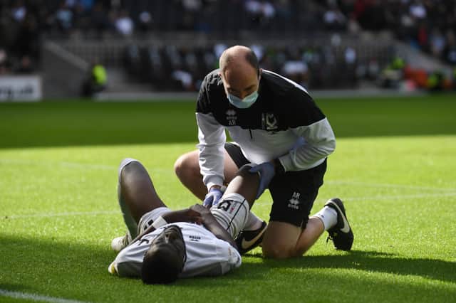 Mo Eisa received treatment at Stadium MK but limped out after suffering this injury. His goal though got Dons going as he fired them in front just before half time, while Matt O’Riley netted their second five minutes from time in the 2-0 win over Accrington Stanley