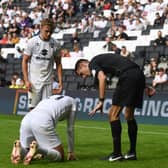 Accrington Stanley manager John Coleman pointed the finger at MK Dons’ “theatrics” as they saw out their 2-0 win at Stadium MK on Saturday