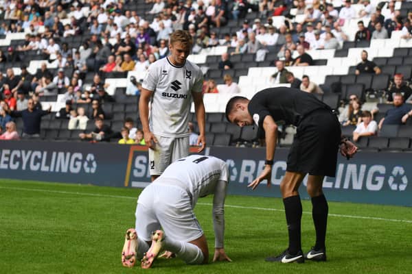 Accrington Stanley manager John Coleman pointed the finger at MK Dons’ “theatrics” as they saw out their 2-0 win at Stadium MK on Saturday