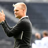Liam Manning wants winning to become a regular feeling in his MK Dons dressing room after they beat Burton Albion 2-1 at the Pirelli Stadium on Tuesday night