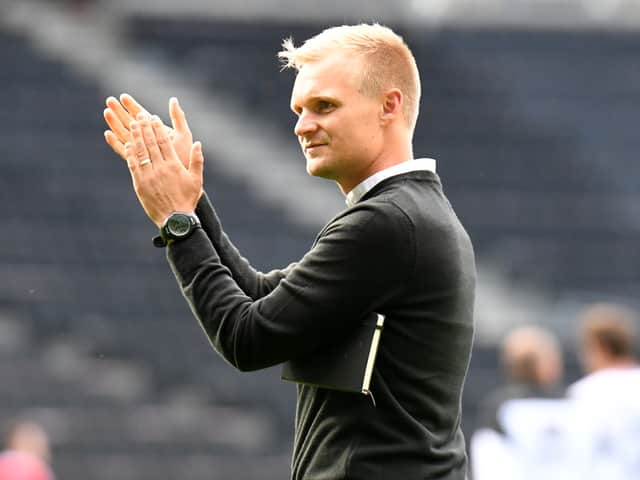 <p>Liam Manning said it is still too early to look too far ahead to what MK Dons can do this season, despite a fine win over Portsmouth</p>