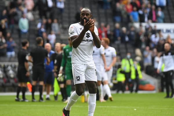 Hiram Boateng scored late in the day to secure a point against Cheltenham Town on Saturday, but MK Dons were disappointed to leave the Jonny-Rocks Stadium with just a point