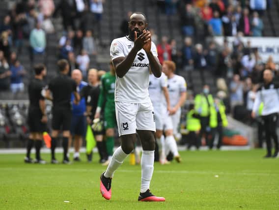 Hiram Boateng scored late in the day to secure a point against Cheltenham Town on Saturday, but MK Dons were disappointed to leave the Jonny-Rocks Stadium with just a point