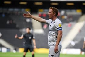 Dean Lewington is set to make his 700th league appearance for MK Dons on Saturday