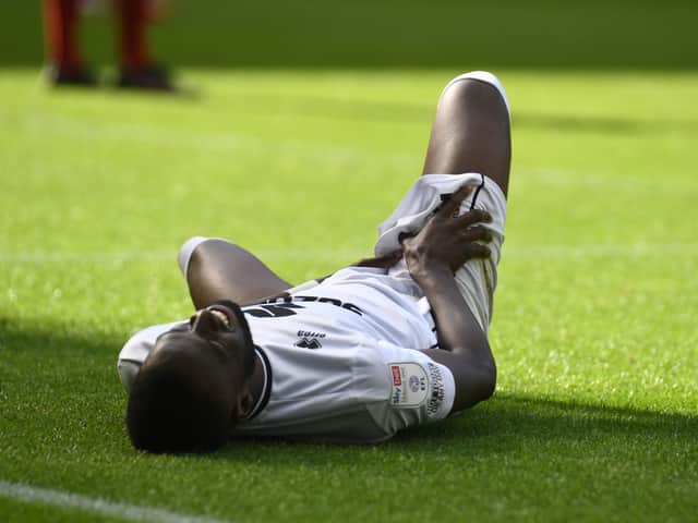 <p>Mo Eisa has been ruled out of Dons’ last three games but could return within the next couple of weeks, said head coach Liam Manning. David Kasumu is also nearing a return after his hamstring injury</p>