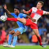 David Wheeler, who famously scored the goal to earn MK Dons promotion to League One in 2019, in action against Manchester City’s Raheem Sterling in the week during Wycombe Wanderers’ 6-1 humbling in the Carabao Cup