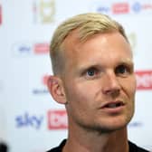 Dons head coach Liam Manning admitted his side made strange decisions late in the day against Wycombe as they held on to win 1-0