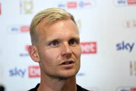 Dons head coach Liam Manning admitted his side made strange decisions late in the day against Wycombe as they held on to win 1-0