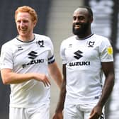 Dons captain Dean Lewington with Hiram Boateng