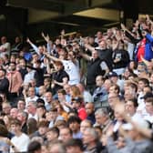 MK Dons supporters cheering on their side during the 1-0 win over Wycombe Wanderers on Saturday - Dons’ fourth win in a row at home