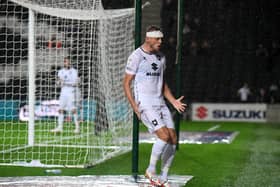 Harry Darling shouts in frustration during MK Dons’ 3-3 draw with Fleetwood Town. Liam Manning said he was disappointed with the manner in which Fleetwood were able to score their goals.