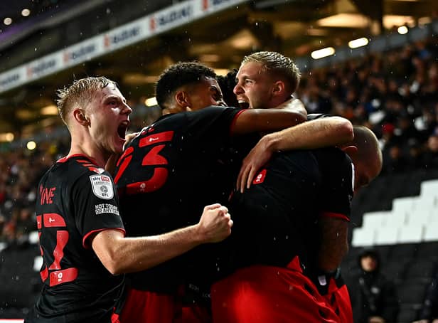 <p>Fleetwood celebrate their late equaliser, though Daniel Batty, as they came from behind to draw 3-3 with MK Dons at Stadium MK. Ged Garner scored a first half brace for the visitors, while Scott Twine scored a sensational hat-trick for Liam Manning’s side.</p>