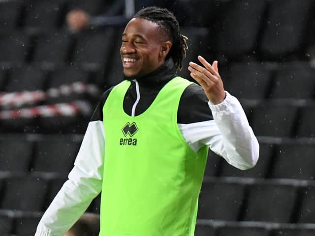 <p>David Kasumu is all smiles at MK Dons at the moment, with the team playing well and unbeaten in nine games. And the 21-year-old marked his return to fitness on Tuesday with a substitute appearance against Fleetwood Town</p>