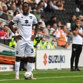 Peter Kioso said he is enjoying the competition for a starting role at MK Dons with Tennai Watson