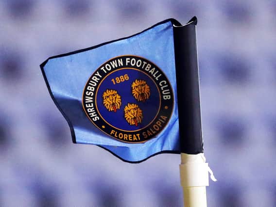 Shrewsbury Town confirmed two fans were ejected from the game with MK Dons on Saturday on allegations of racial abuse