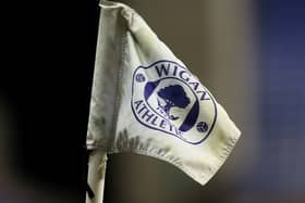 Dons travel to Wigan Athletic on Tuesday night