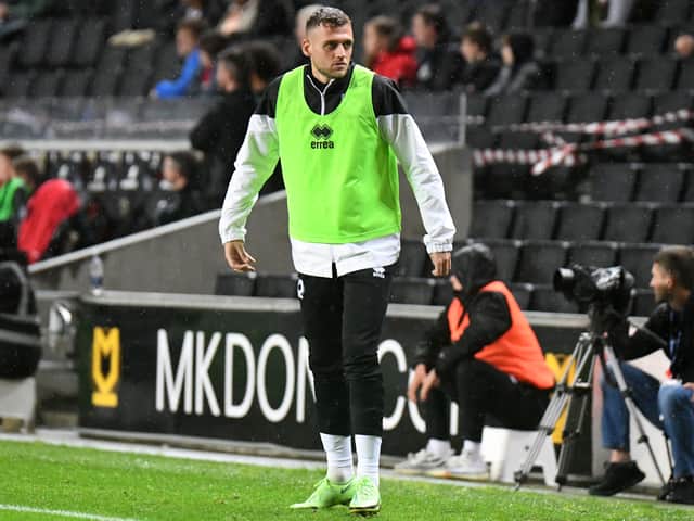 <p>Aden Baldwin has made just four appearances for MK Dons since signing in the summer, but Warren O’Hora knows he is waiting in the wings for his opportunity should the Irishman’s form drop</p>