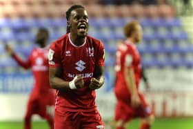 Peter Kioso celebrates MK Dons’ victory over Wigan Athletic on Tuesday night. Kioso equalised for Dons after 30 minutes, cancelling out Charlie Wyke’s goal before a Wigan own goal saw Dons to victory at the DW Stadium