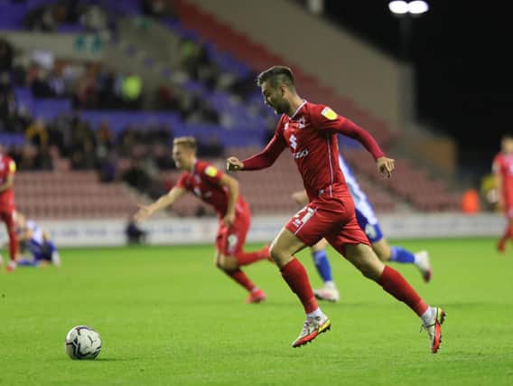 Daniel Harvie provided both assists for Dons’ goals on Tuesday night as they beat Wigan 2-1 at the DW Stadium. Peter Kioso headed his first cross home to equalise before an own goal just before half time