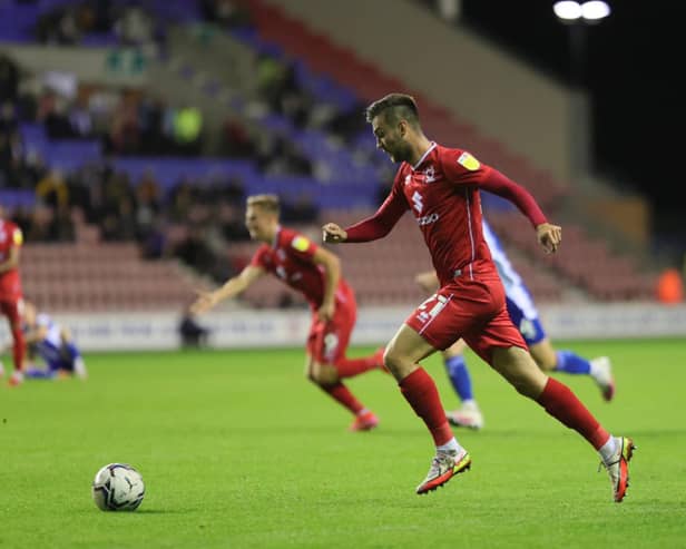 Daniel Harvie provided both assists for Dons’ goals on Tuesday night as they beat Wigan 2-1 at the DW Stadium. Peter Kioso headed his first cross home to equalise before an own goal just before half time