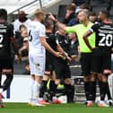 Dons’ head coach Liam Manning was unimpressed with the performance of referee Chris Sarginson and his assistants during the 3-0 defeat to Rotherham United on Saturday
