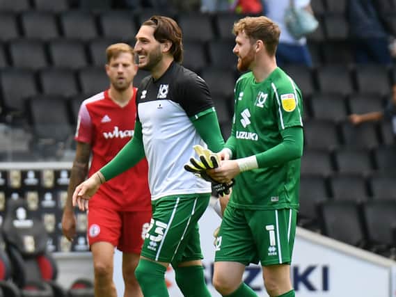 Franco Ravizzoli is loving life at MK Dons in the goalkeeping squad with Andrew Fisher and Laurie Walker