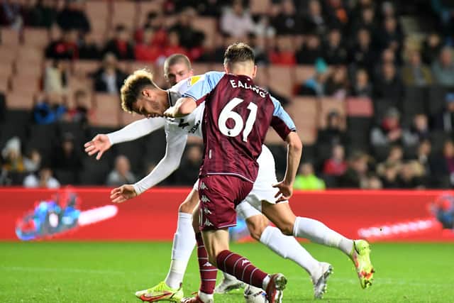 Josh Martin in action for MK Dons against Aston Villa U21s on Tuesday night