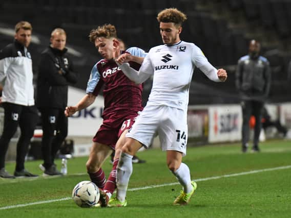 Josh Martin says he is learning a lot at MK Dons - not just a new position, but also the harsh realities of first team football