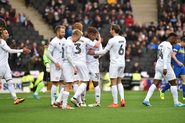 MK Dons celebrate Brandon Thomas-Asante’s first professional goal in the 3-2 win over Spennymoor Town