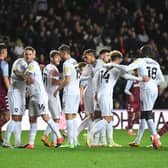 MK Dons celebrate scoring against Aston Villa U21s in the Papa John’s Trophy