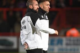 David Wright and Chris Hogg are in constant conversation during MK Dons matches