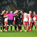 Josh Martin, along with his MK Dons team-mates, were stunned by his first-half red card at the Lamex Stadium on Tuesday