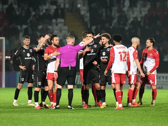 Josh Martin, along with his MK Dons team-mates, were stunned by his first-half red card at the Lamex Stadium on Tuesday