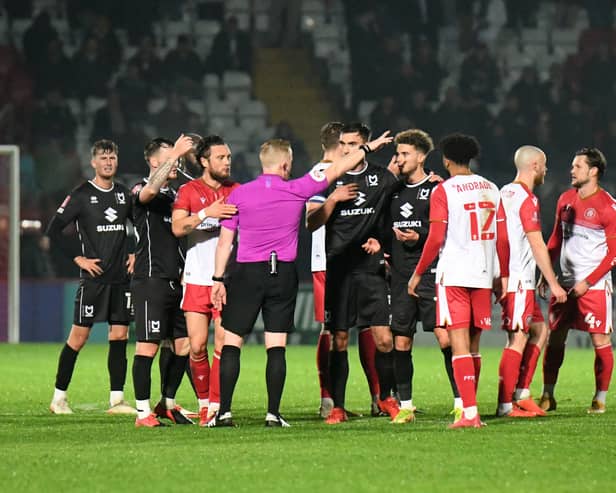 Josh Martin, along with his MK Dons team-mates, were stunned by his first-half red card at the Lamex Stadium on Tuesday