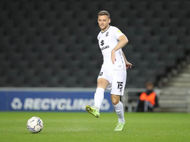 <p>Aden Baldwin made just his second league start of the season on Saturday and helped MK Dons to only their fourth clean sheet. Max Watters’ sixth goal in six matches saw Dons win 1-0 against Burton</p>