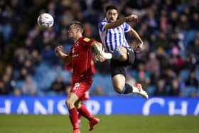 Massimo Luongo of Sheffield Wednesday battles for possession with Scott Twine during the 2-1 defeat at Hillsborough