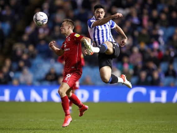 Massimo Luongo of Sheffield Wednesday battles for possession with Scott Twine during the 2-1 defeat at Hillsborough