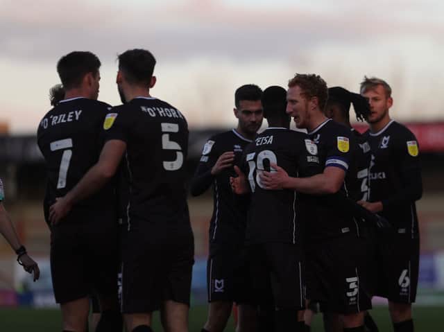 <p>MK Dons celebrate at Morecambe</p>