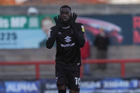 Mo Eisa celebrates a typical Mo Eisa goal against Morecambe